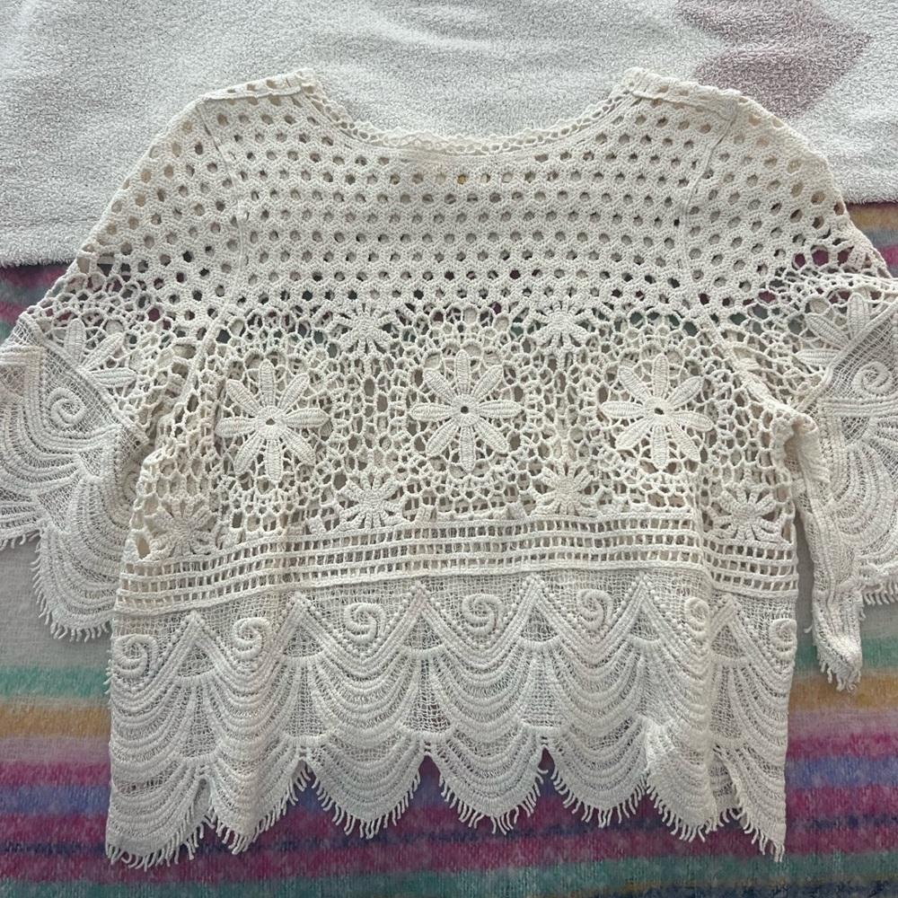 Imperfect condition crocheted top